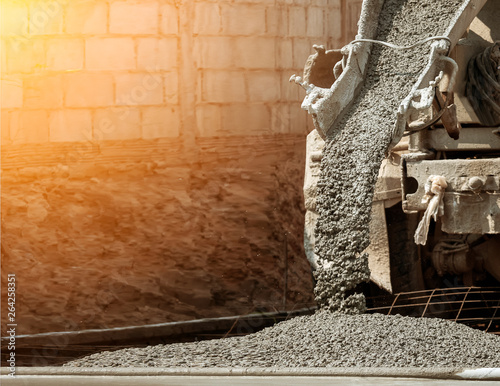 Pouring ready-mixed concrete after placing steel reinforcement © Touch1976