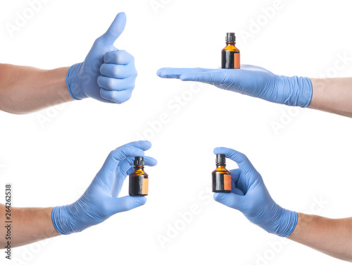 Hands of a medic wearing a blue latex gloves