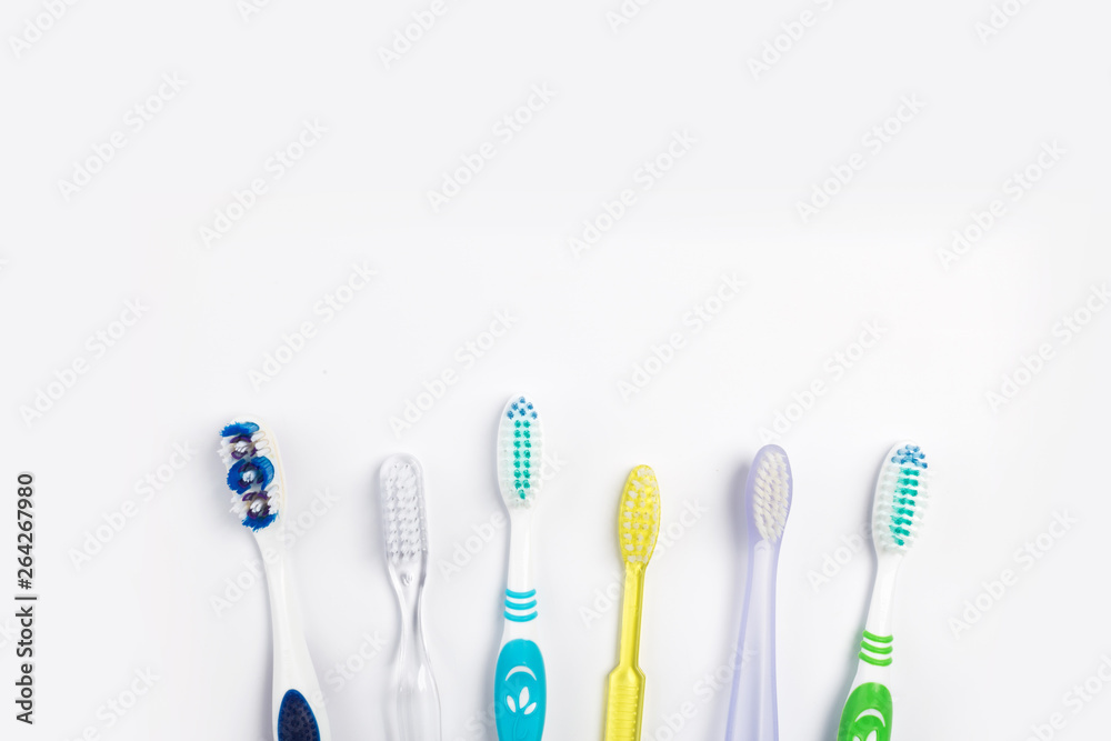 New different toothbrushes on a white background New different toothbrushes on a white background