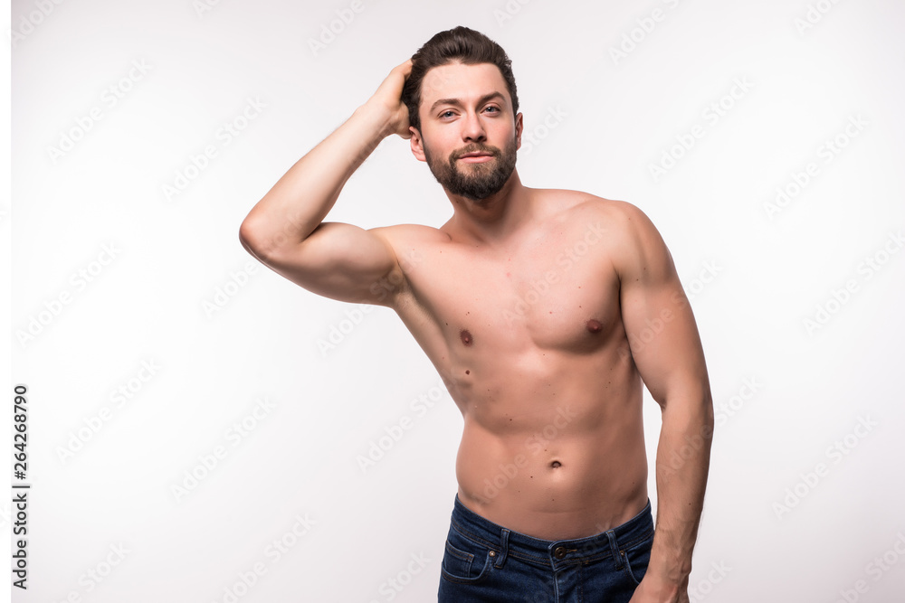 Half naked body of muscular athletic man isolated on white background
