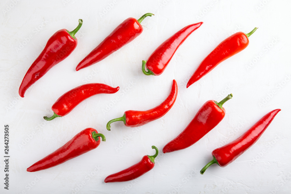 Red pepper pattern on white background. Top view,  flat lay, close-up. Ramiro pepper. Food concept.