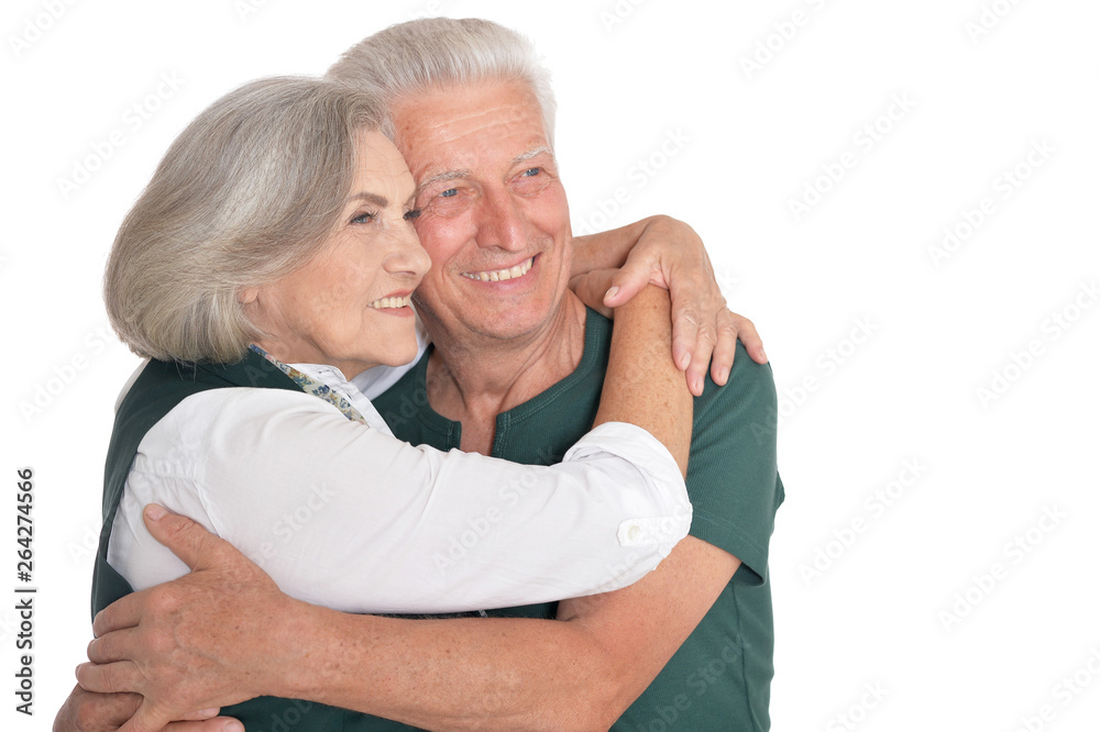 Portrait of happy senior couple posing isolated on white background Portrait of happy senior couple posing isolated on white background