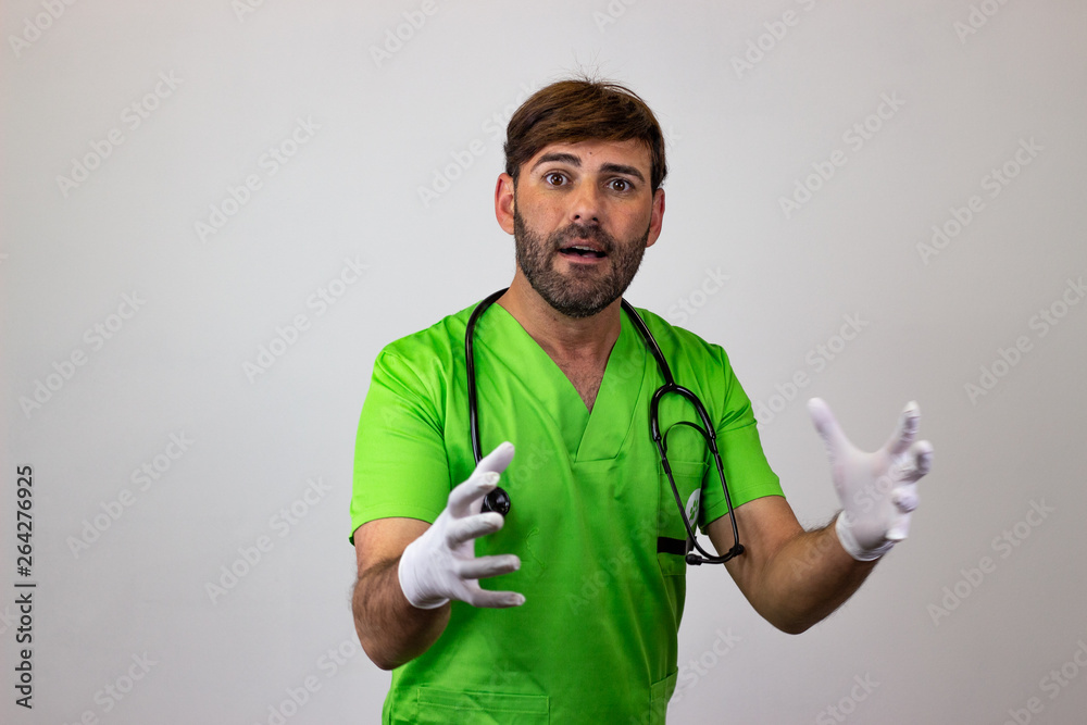 Portrait of male veterinary doctor in green uniform with brown hair ambitious, their back facing the camera and looking at the camera. Isolated on white background.