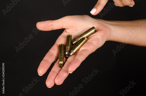 Female hand with bullets