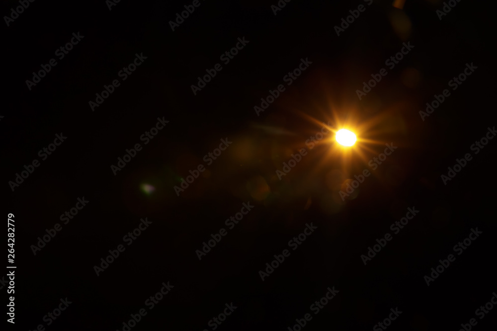 Abstract Natural Sun flare on the black background. Abstract Natural Sun flare on the black background.