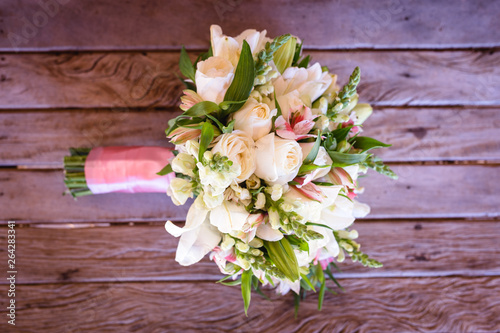 wedding bouquet on wooden table, rustic bouquet for bride. © RHJ