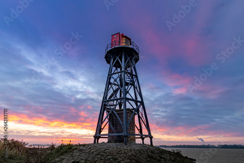 old lighthouse at sunrise