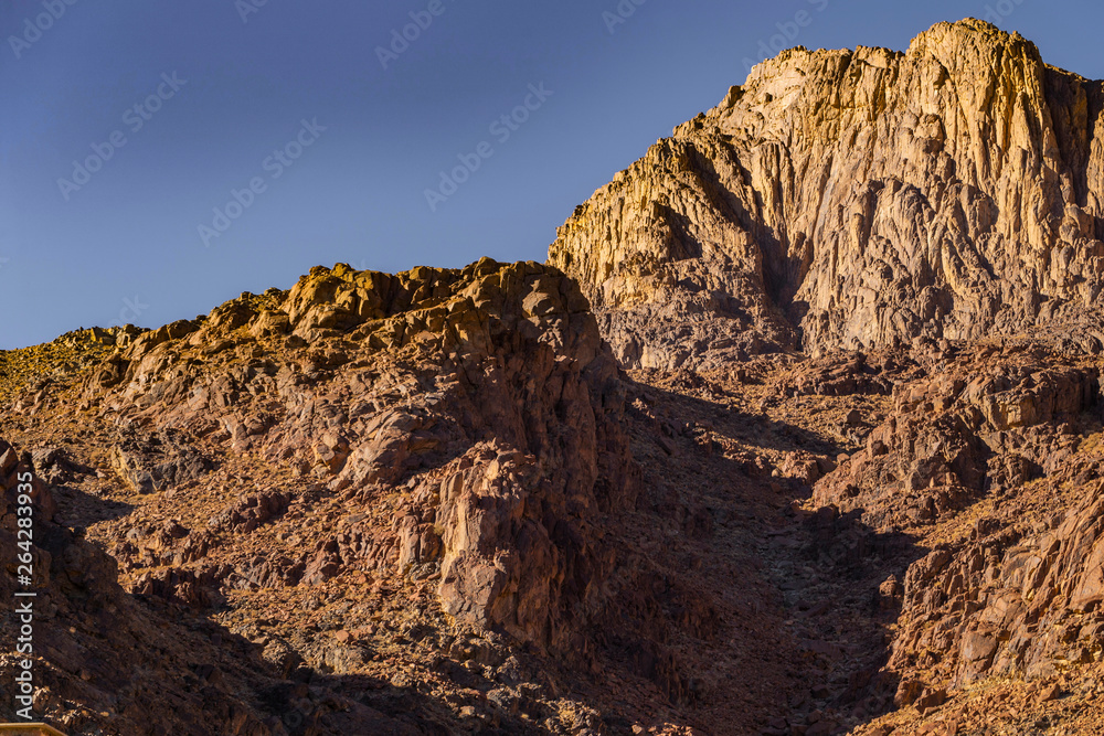 Obraz premium Egypt. Mount Sinai in the morning at sunrise. (Mount Horeb, Gabal Musa, Moses Mount). Pilgrimage place and famous touristic destination.