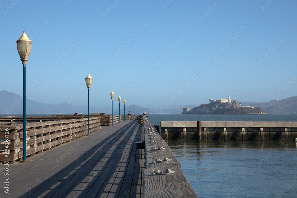 Pier 39 in San Francisco Bay Area with Alcatraz Island in the background