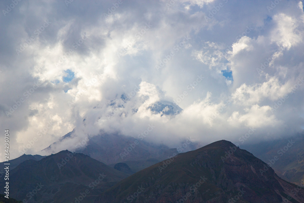 View of Caucasus mountains near Kazbek peak, Stepantminda, Georgia