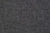 unfocused blurred dark jeans material surface wallpaper pattern concept 