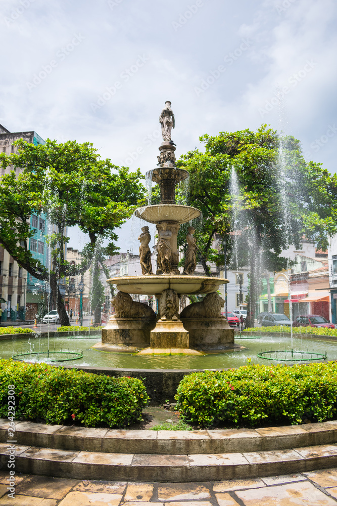Fototapeta premium Recife, Brazil - Circa April 2019: Water fountain at Maciel Pinheiro square in Boa Vista neighborhood