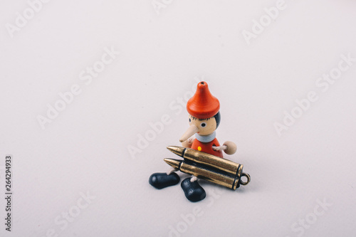 Bullet and wooden pinocchio...