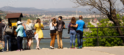 Photography tourists are looking at Budapest - a view of the city of Pest from the hills, Ci