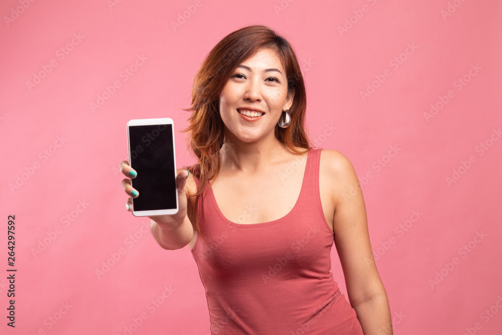Young Asian woman with mobile phone. Young Asian woman with mobile phone.