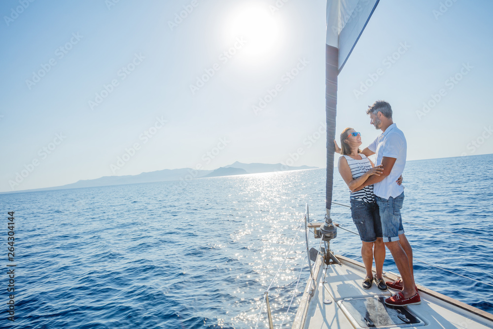 Romantic couple relaxing on yacht in Greece Romantic couple relaxing on yacht in Greece