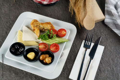 berakfast with cherry tomatoes and olives photo