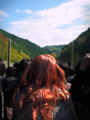 River boat with redhead woman