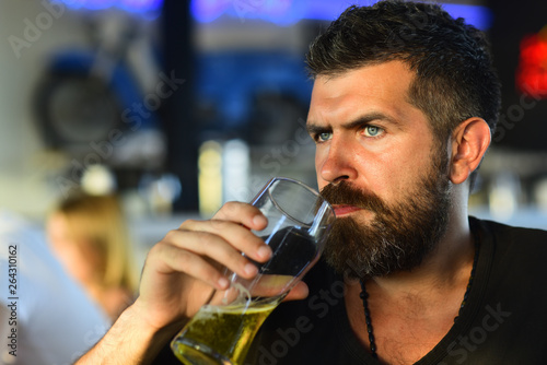 Man holding mug of beer. Man drinking beer. Retro man with a beer. Beer pubs and bars.