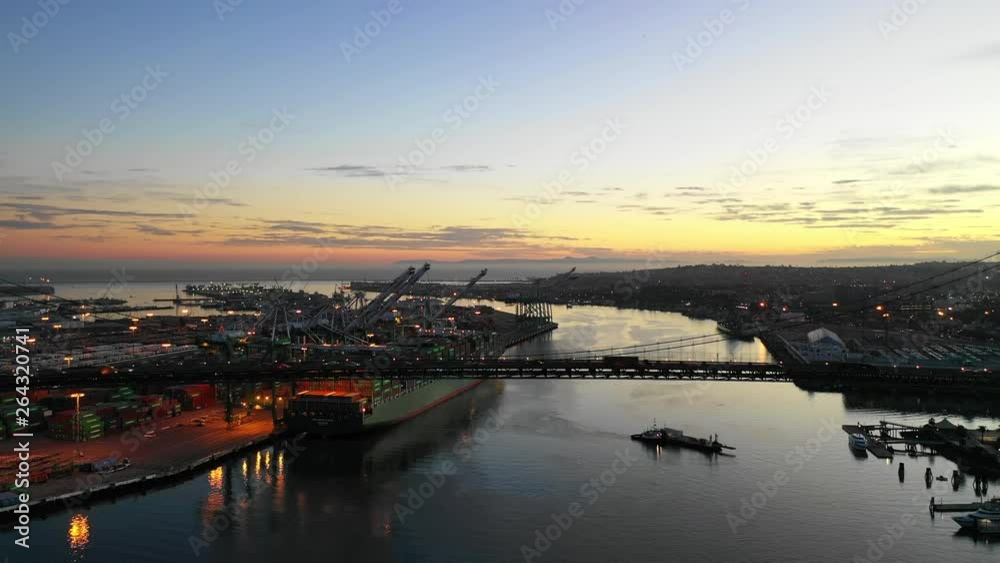 Aerial Descend: Busy Bridge Over River With Evening Sky Above in Long Beach, United States of America Aerial Descend: Busy Bridge Over River With Evening Sky Above in Long Beach, United States of America