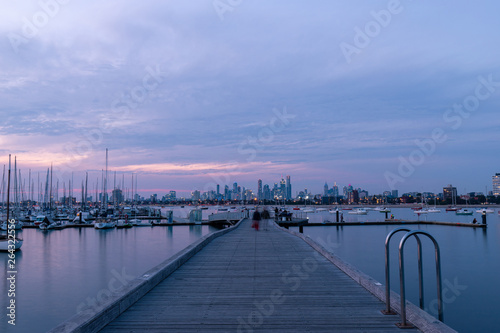 Melbourne skyline, pier, and boats view at dusk time. © AlexandraDaryl
