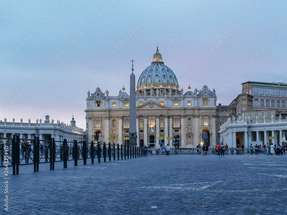 wide low angle view of dusk at st peter's in the vatican