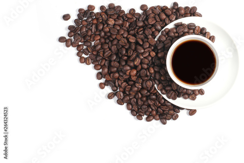 Coffee cup and beans isolated on a white background  space for text   Top view