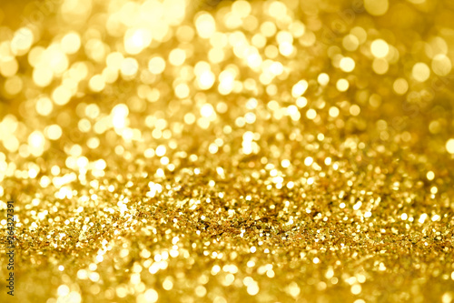 Gold dust sand glitter background shine for decoration christmas or celebration Luxury and elegant