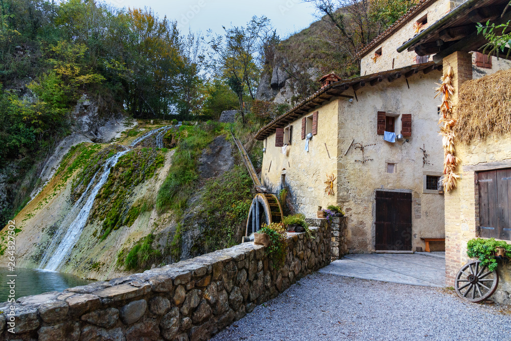 Ancient watermill wheel, Molinetto della Croda in Lierza valley. Refrontolo. Italy