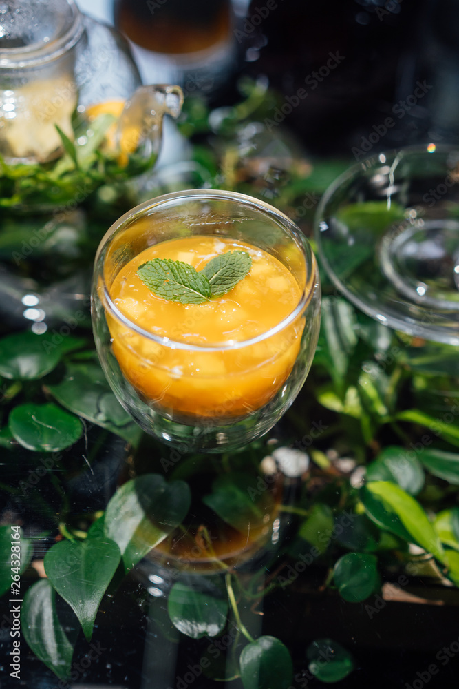 Fresh passion fruit and a glass of passion fruit drink Fresh passion fruit and a glass of passion fruit drink