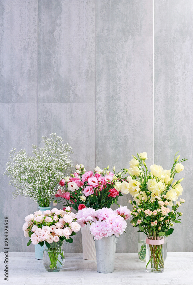 Fototapeta premium Bouquets of colorful flowers. Peony, rose, lisianthus, gypsophila paniculata.