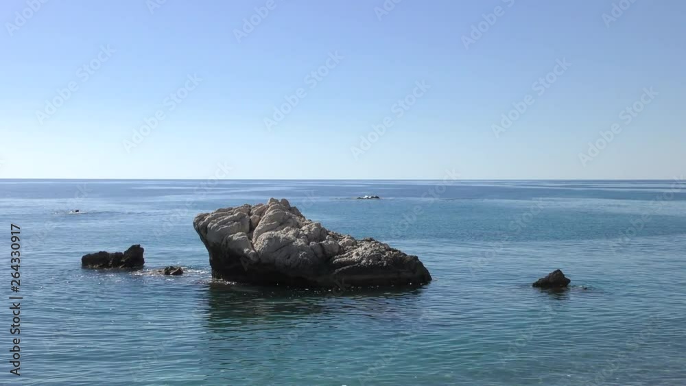 Stones in the water near the shore near popular resting place Stones in the water near the shore near popular resting place