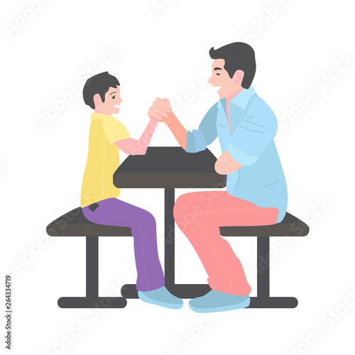 dad competes with his son in arm wrestling. A man with a little boy is sitting on a bench at the table.
