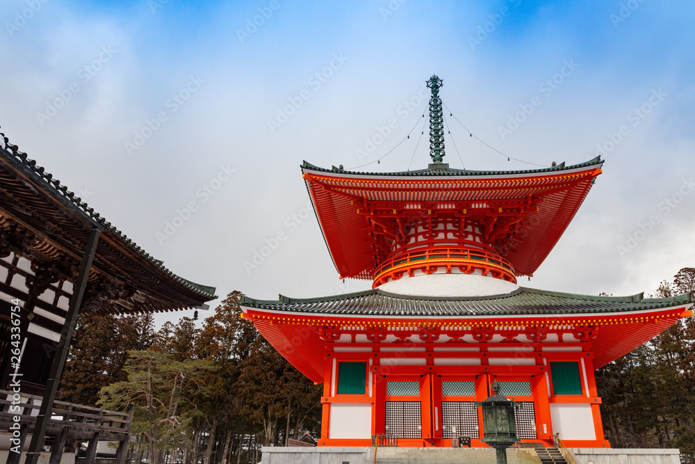 Konpon Daitô red pagoda in Danjo Garan, Koyasan, covered with snow on a clear winter day, UNESCO World Heritage area, Wakayama Prefecture, Japan. Konpon Daitô red pagoda in Danjo Garan, Koyasan, covered with snow on a clear winter day, UNESCO World Heritage area, Wakayama Prefecture, Japan.