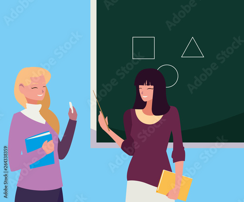 female teachers couple with textbooks and chalkboard