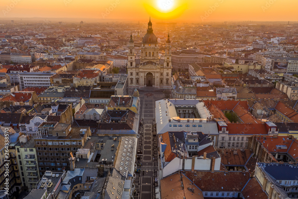 Budapest, Hungary - Sunrise over Budapest on an aerial drone shot with St. Stephen's Basilica and Zrinyi street