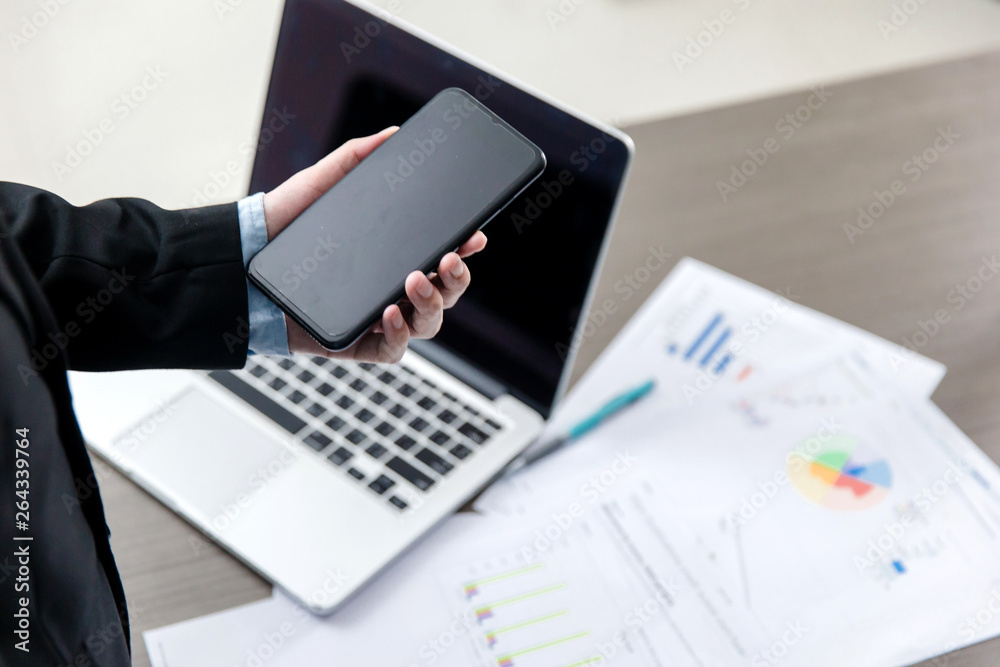 smart phone holding in businessman hands. Blurred background. Horizontal mockup smart phone holding in businessman hands. Blurred background. Horizontal mockup