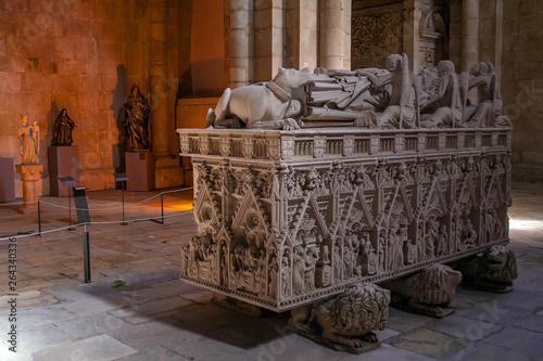 Alcobaca, Portugal. Gothic Tomb of King Dom Pedro with recumbent effigy. Monastery of Santa Maria de Alcobaca Abbey. Funerary art Masterpiece. photo