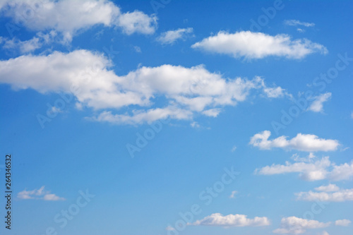 Blue Sky With Scattered Clouds With A Sun 