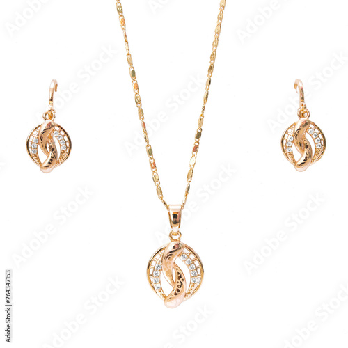 Fototapeta gold necklace and ear rings jewelry isolated on white background