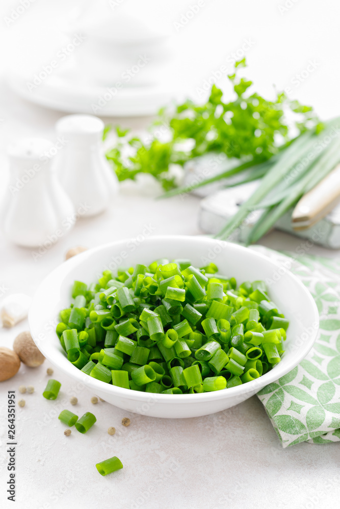 Fresh green onion sliced in bowl Fresh green onion sliced in bowl