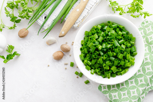 Fresh green onion sliced in bowl