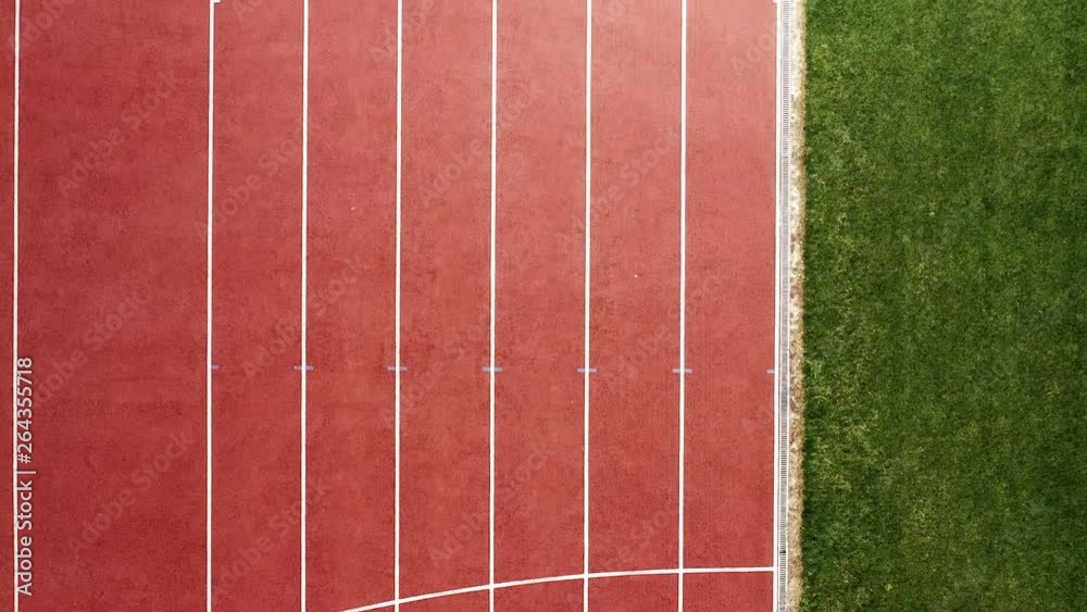Overhead view of red running track in the stadium