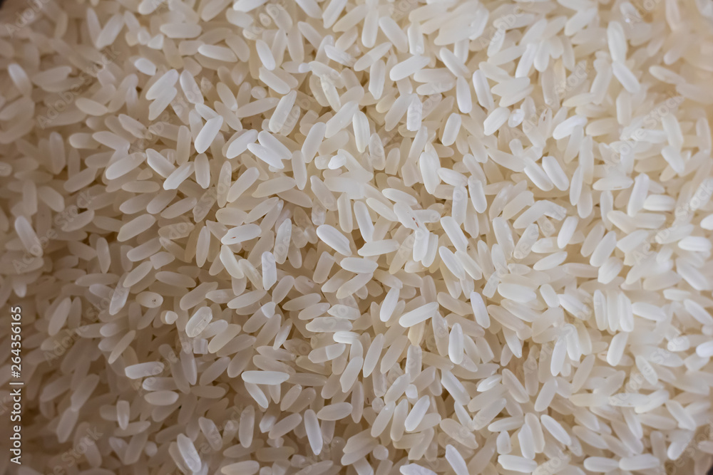 Ingredients for making pilaf, rice closeup on a dark background. Horizontal orientation Ingredients for making pilaf, rice closeup on a dark background. Horizontal orientation