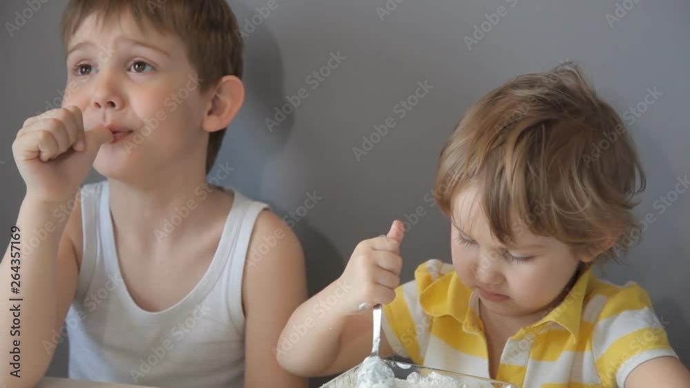 Children knead the dough. Add flour, sugar, eggs, butter Children knead the dough. Add flour, sugar, eggs, butter