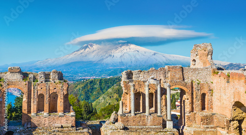 Fotografie, Obraz Ancient Greek theatre in Taormina on background of Etna Volcano, Sicily, Italy