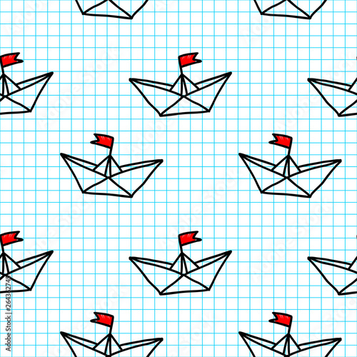 Hand drawn paper ships on the checkered sheet of paper background seamless vector pattern
