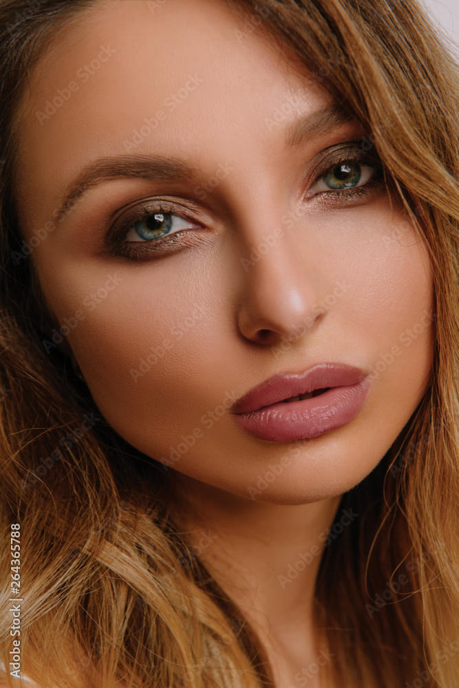 Woman with Beautiful Evening Makeup& Luxury Salon Style. Sexy Lips and Eyes