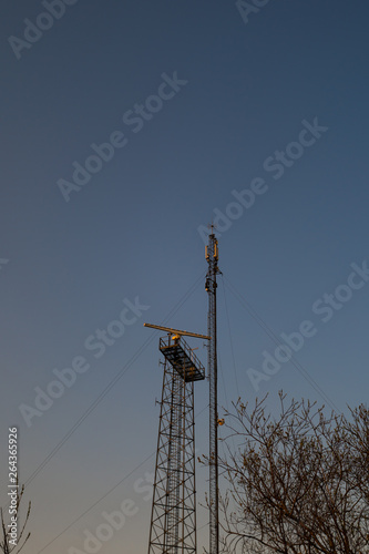 Coastal beach radar pillar during a sunset in European country Latvia photo