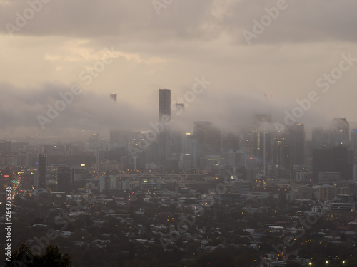 Brisbane City sunrise with dramatic mist